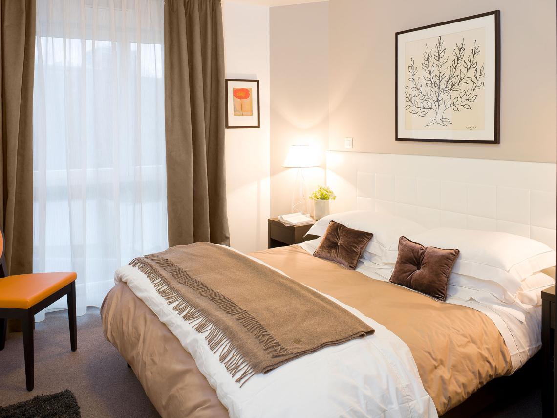  : Chambre d'un appartement du Jardin d'Aragon Cogedim Club
